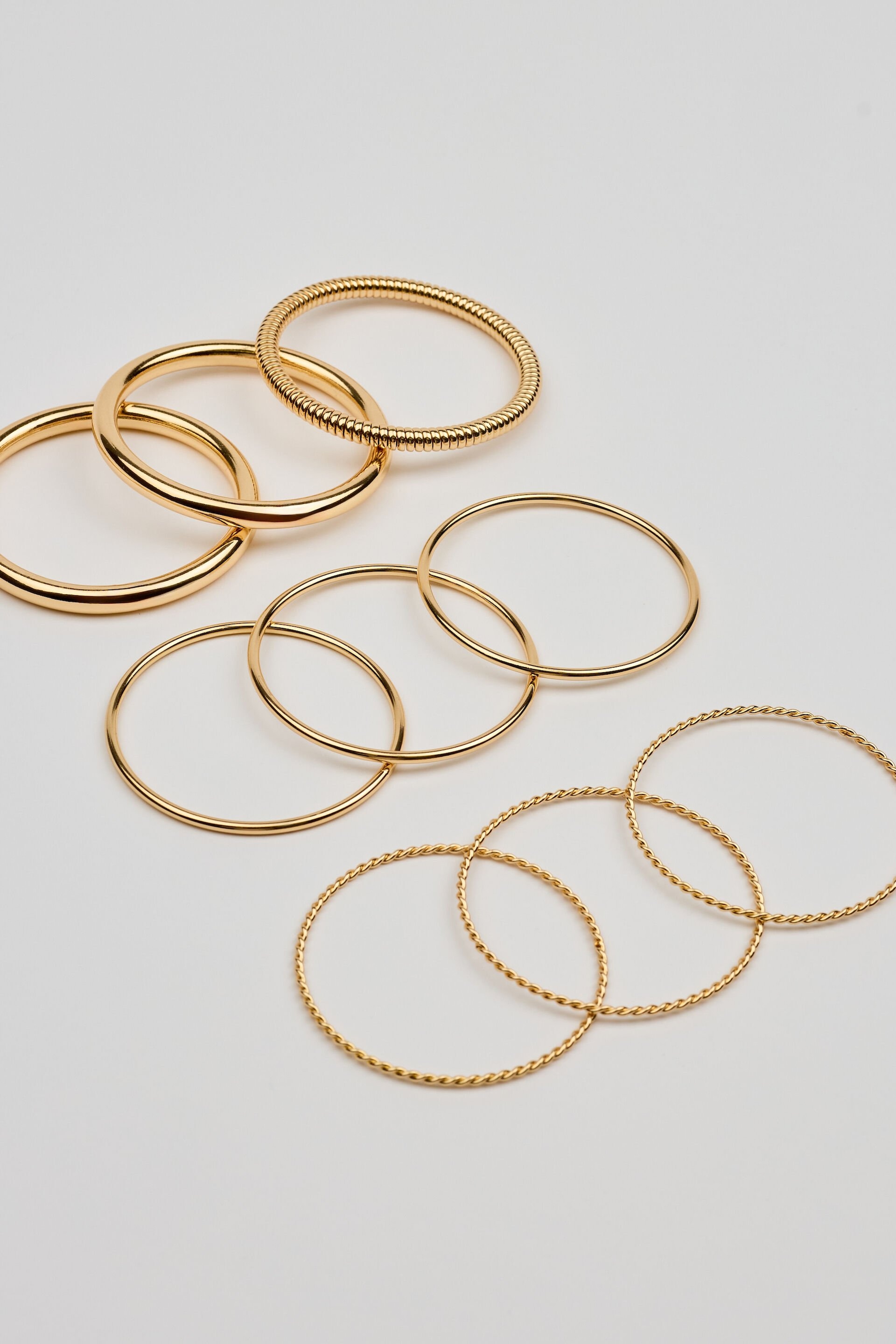 Set of 9 Twisted Bangles