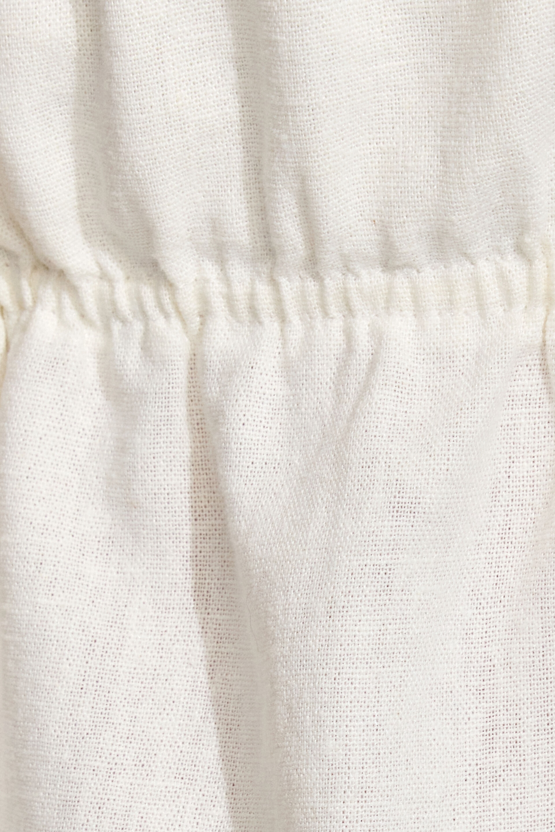 Haut ouvert à col licou en lin