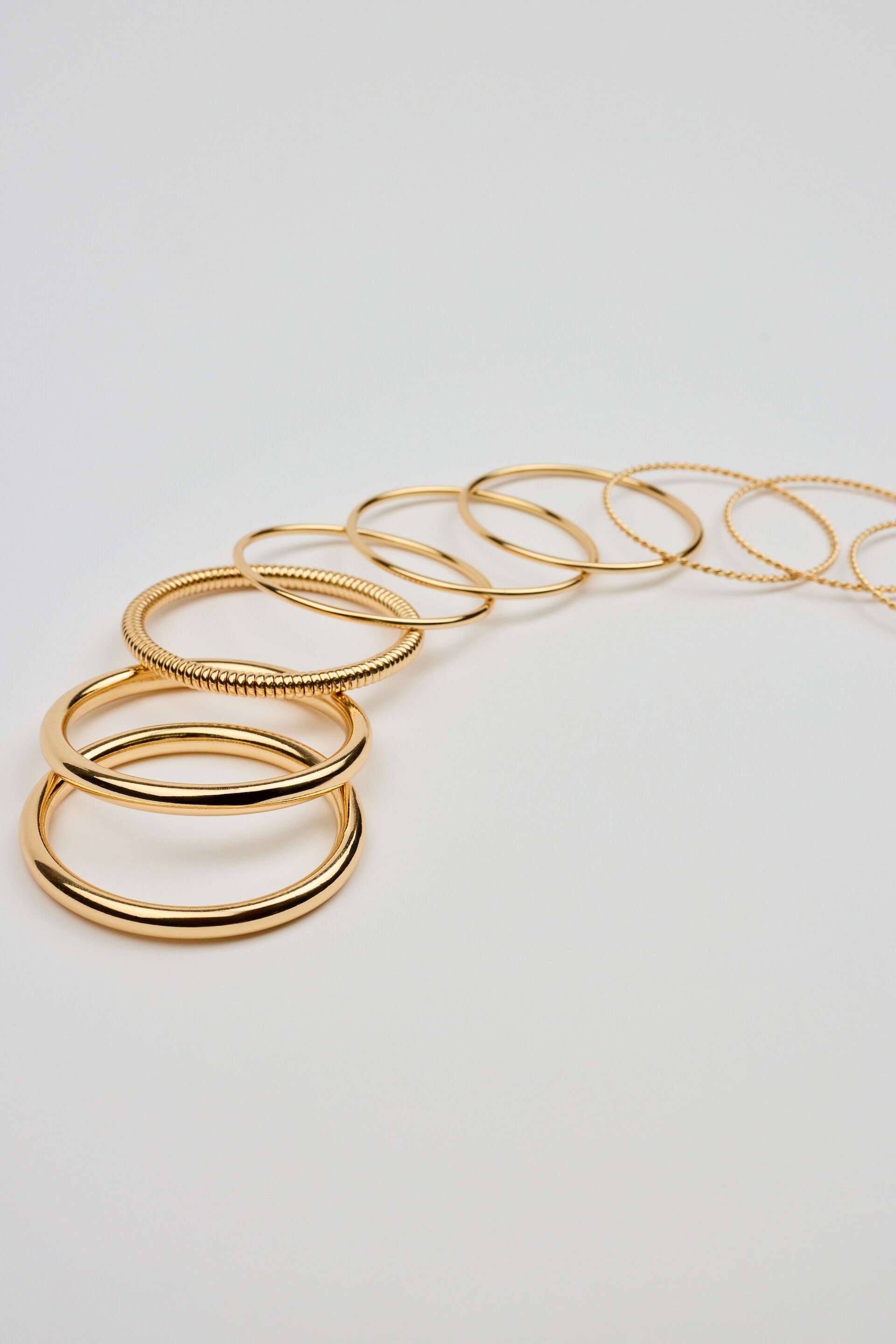 Set of 9 Twisted Bangles