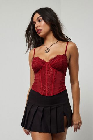 red lace corset top with jeans and black jacket
