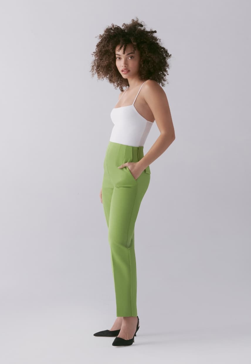 A model wears the Kendall slim leg pants.