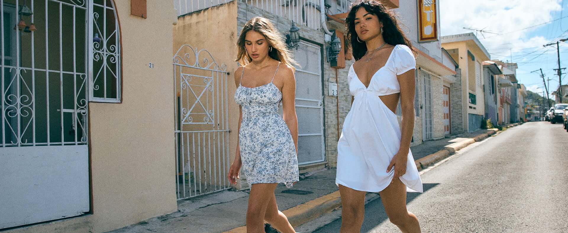 Models are wearing short length dresses.