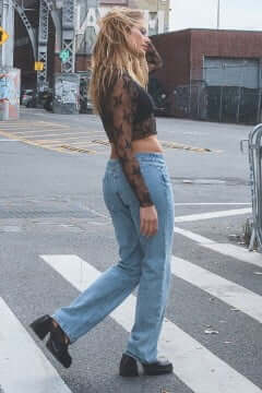 Model wearing Garage jeans.