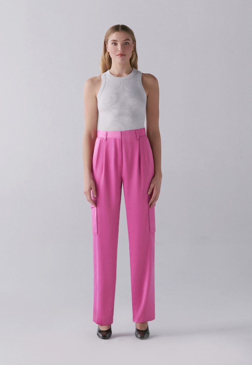 A model wears the Izabel satin cargo pants