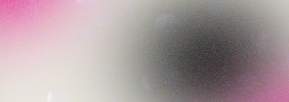 Model is weaing a purple mini puffer and white cargo pants