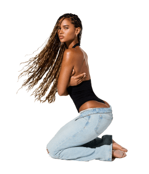 Model poses wearing GARAGE clothing.