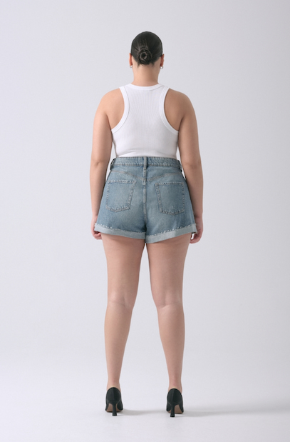 A model wears the Claudia mom shorts.