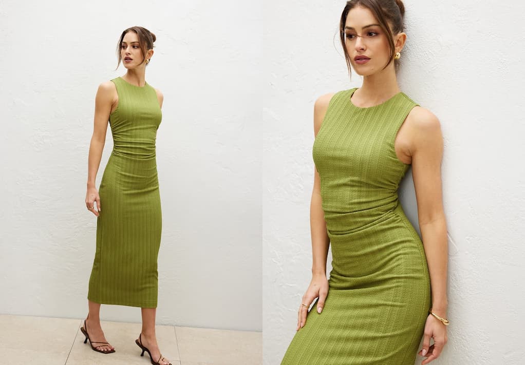 Model is wearing a green textured maxi dress.