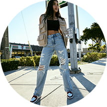 Model is wearing latest spring styles.