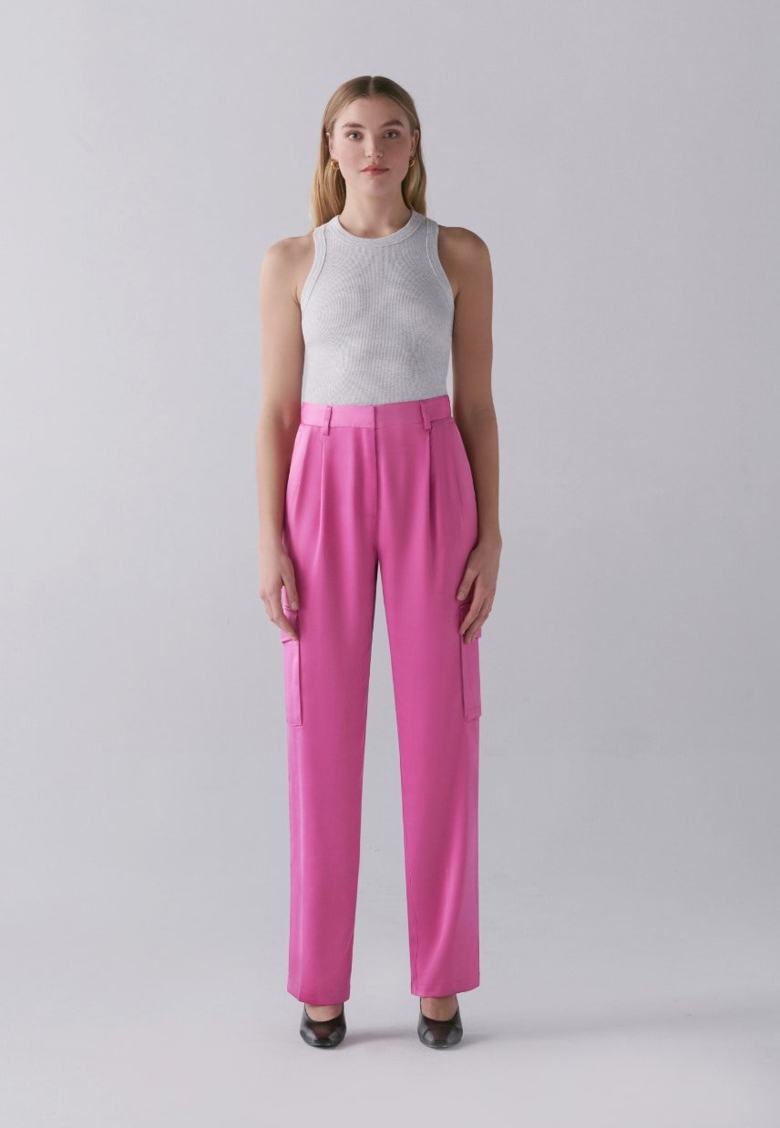 A model wears the Izabel satin cargo pants