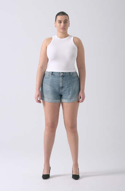 A model wears the Claudia mom shorts.