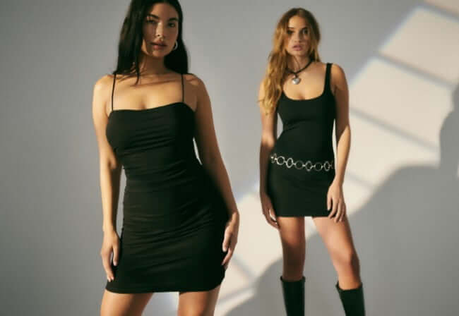 Model is wearing a white active dress.