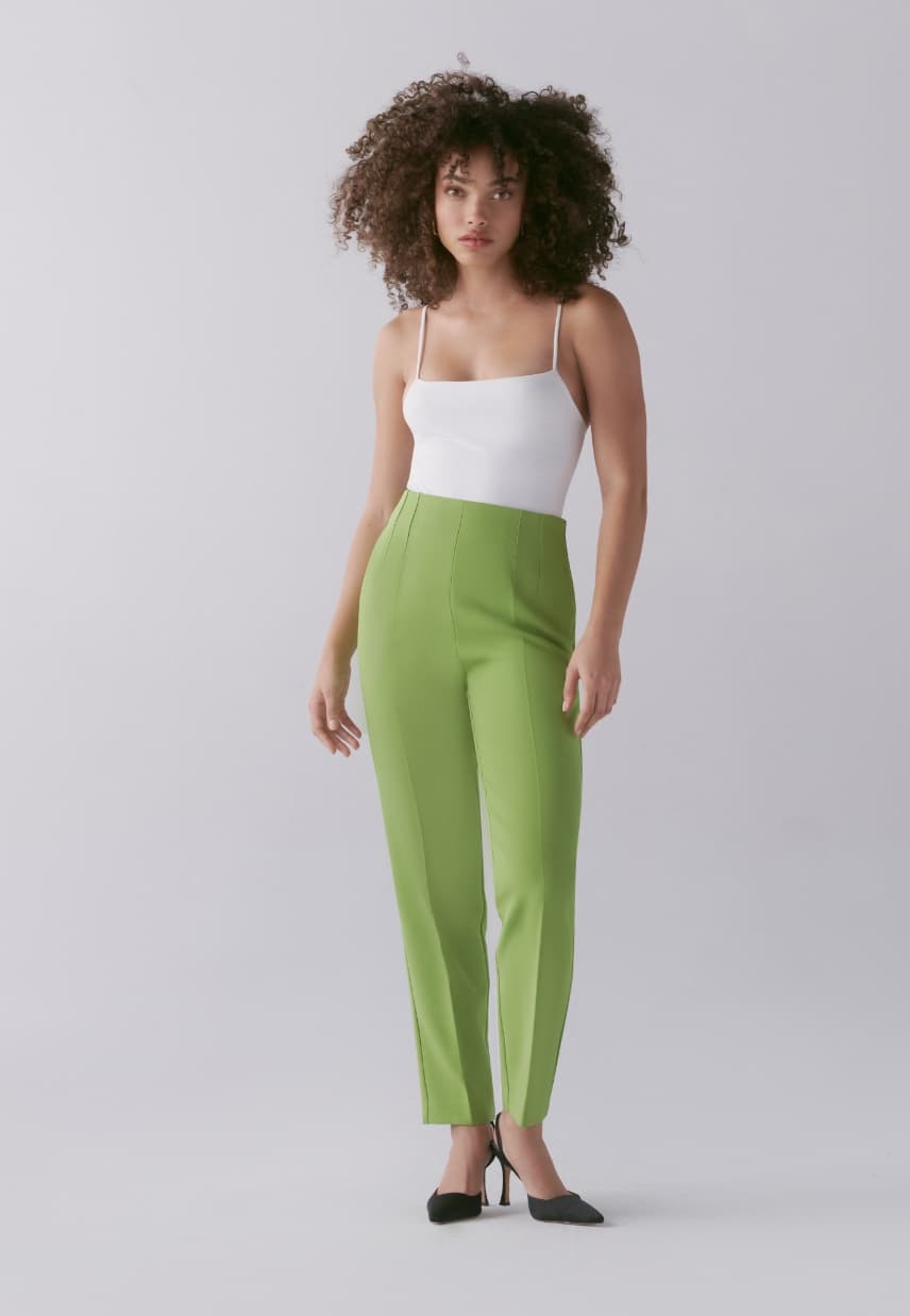 A model wears the Kendall slim leg pants.