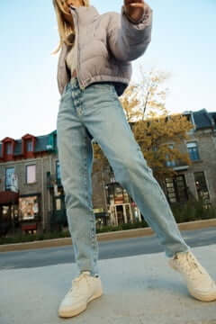 Model wearing Garage jeans.